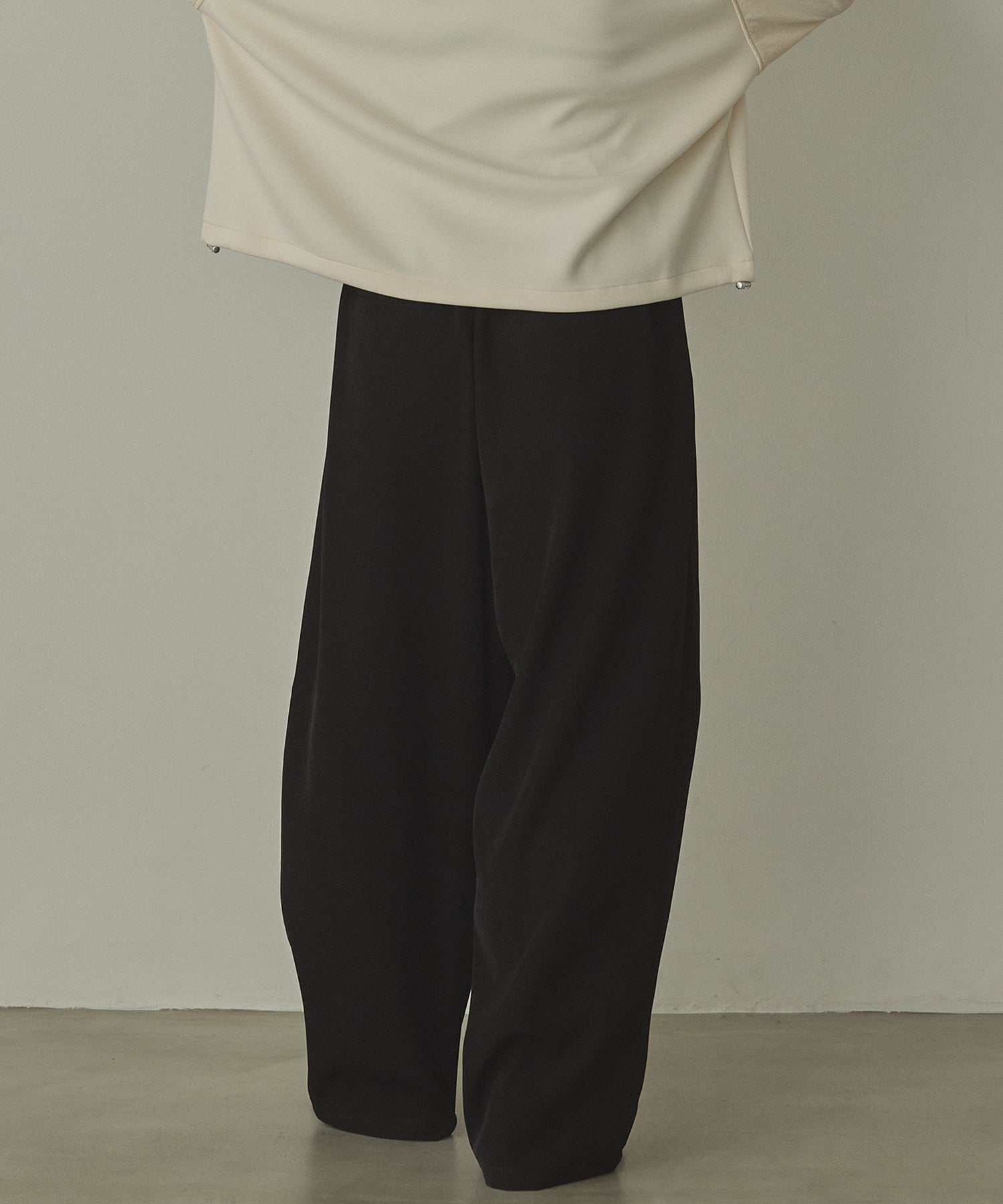 ポリツイル カーヴィパンツ