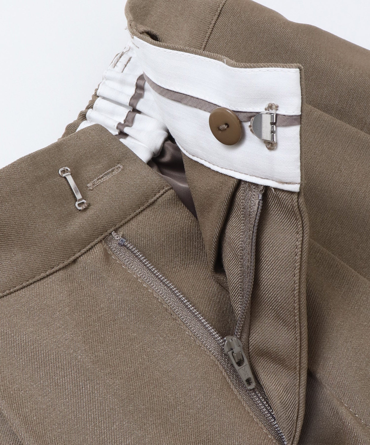 ポリツイル カーヴィパンツ