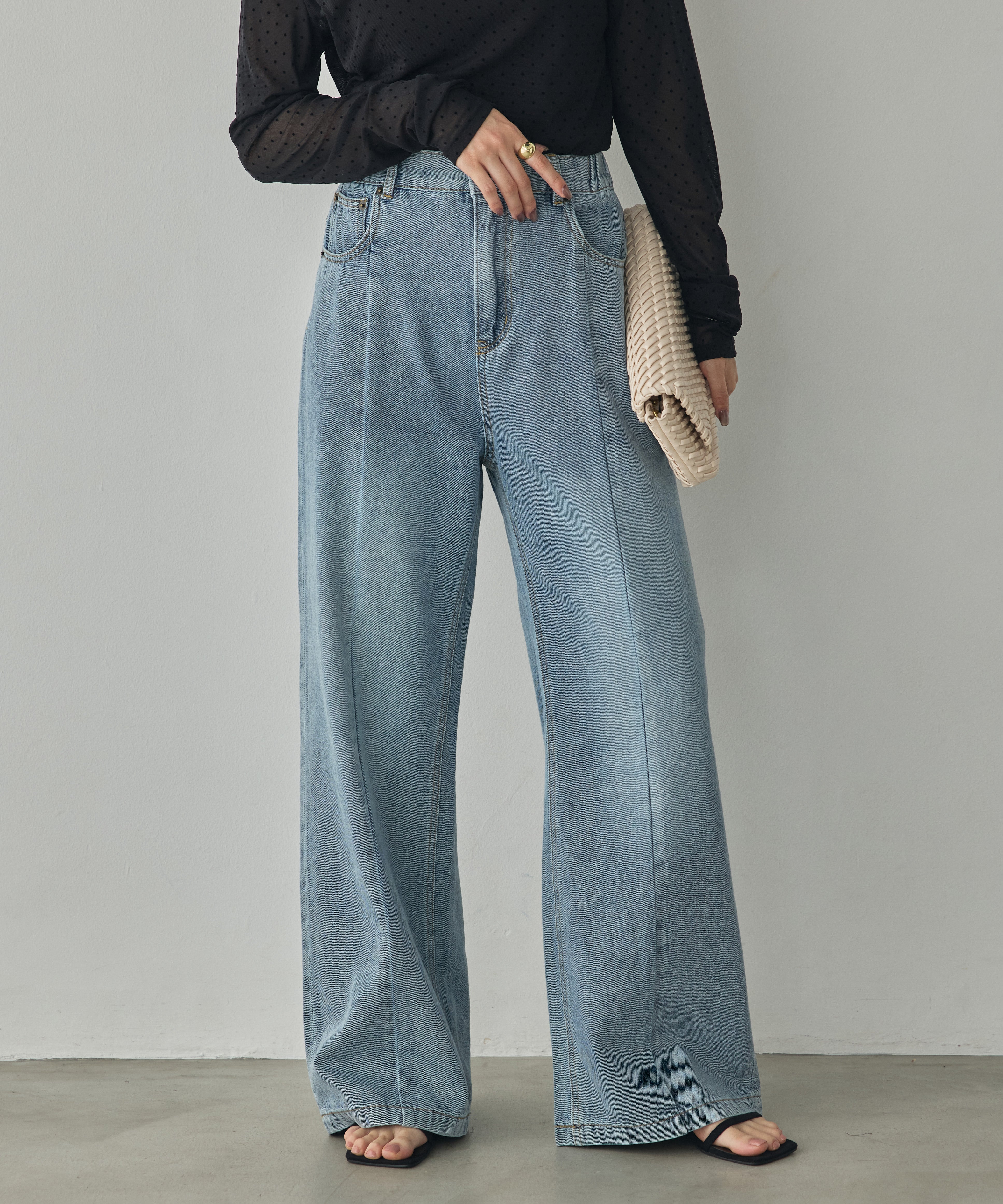 CENTER-SEAM SEMI-FLARED DENIM PANTS