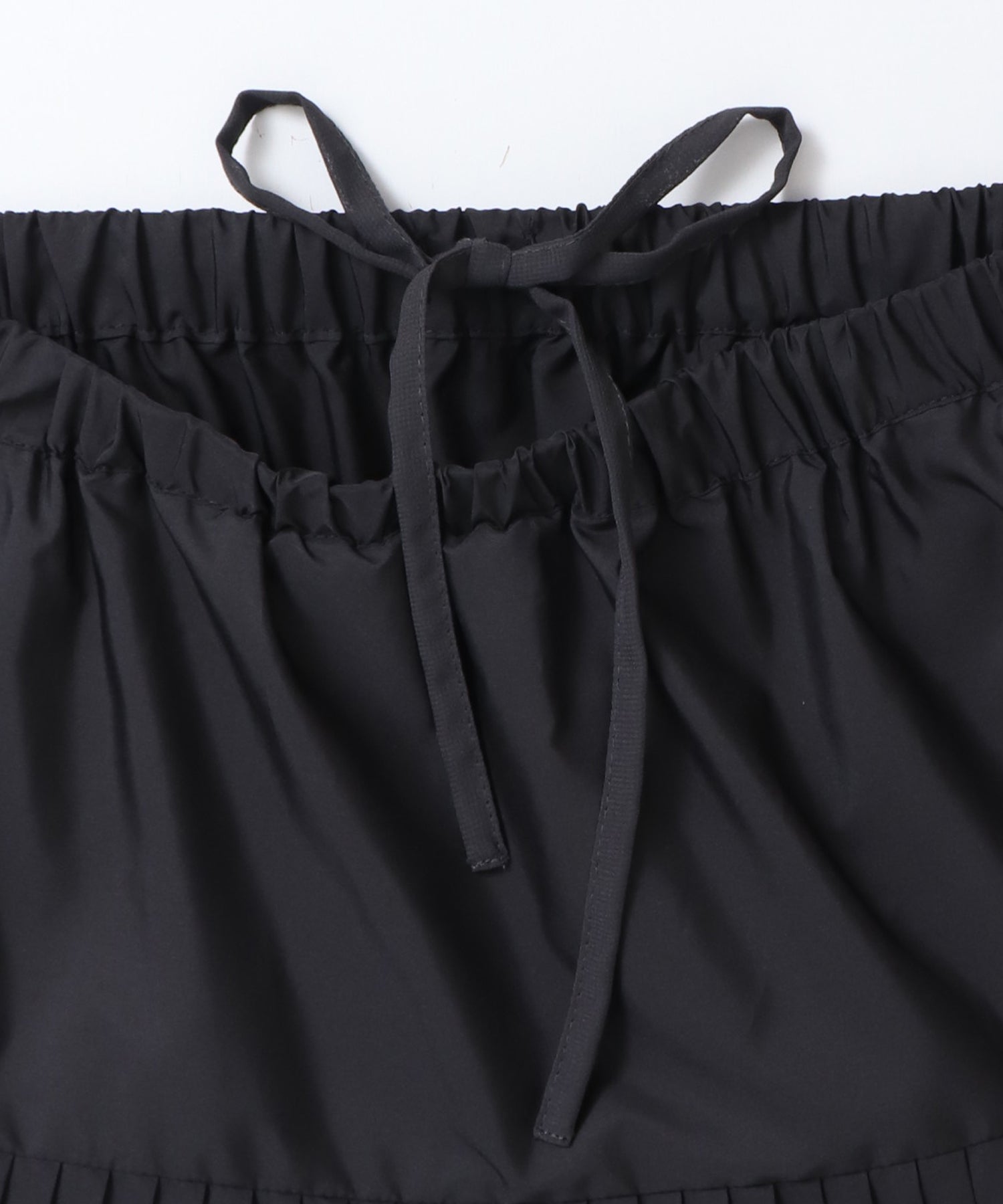 PLEATED TIERED SKIRT