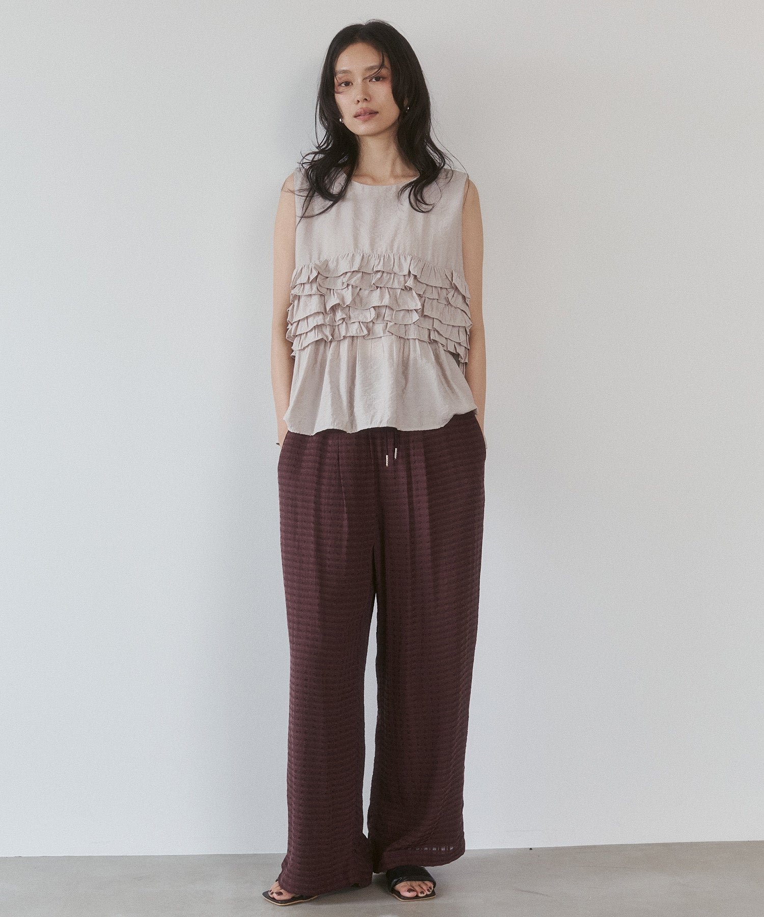 SLEEVELESS RUFFLED TOPS