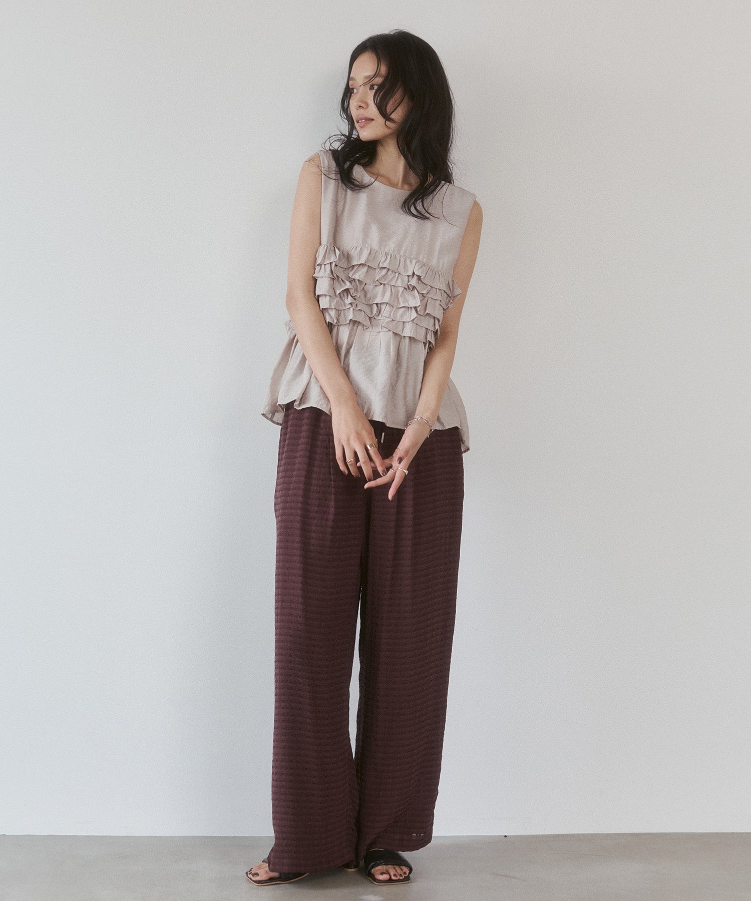 SLEEVELESS RUFFLED TOPS