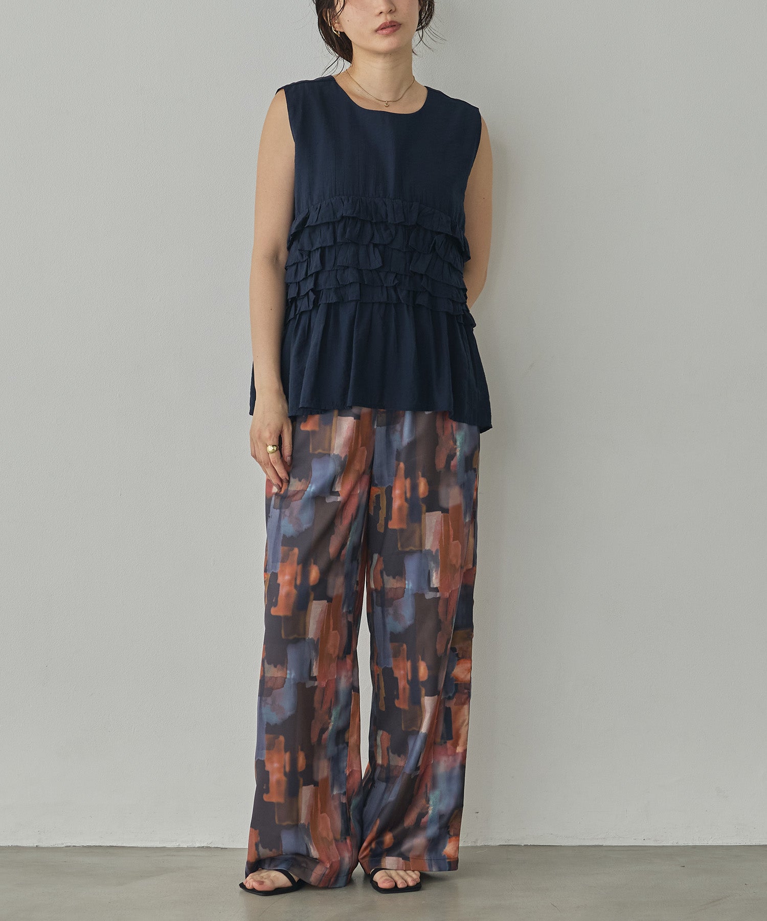 SLEEVELESS RUFFLED TOPS