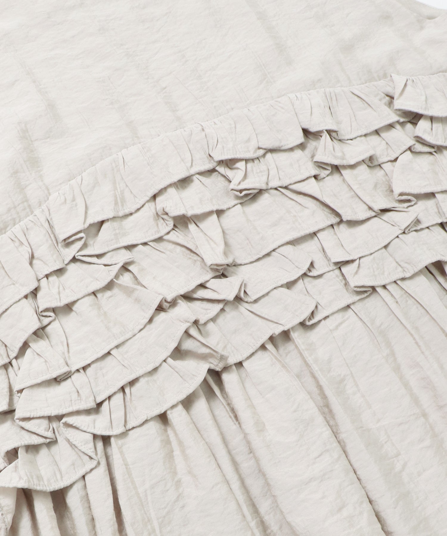 SLEEVELESS RUFFLED TOPS