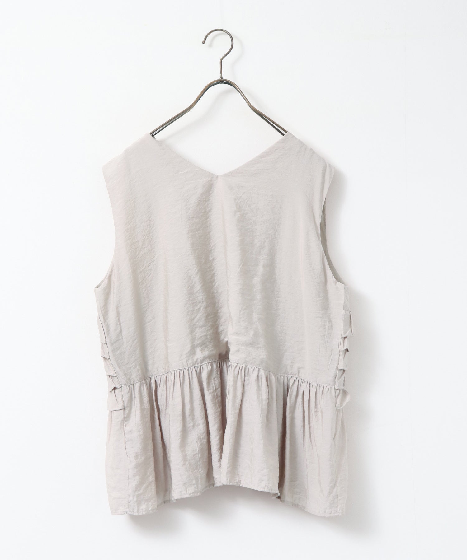 SLEEVELESS RUFFLED TOPS