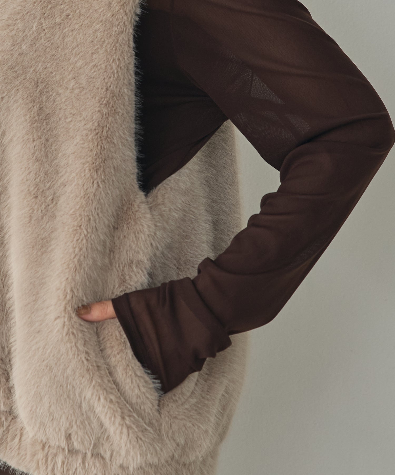 MIDI-LENGTH V-NECK FAUX FUR VEST