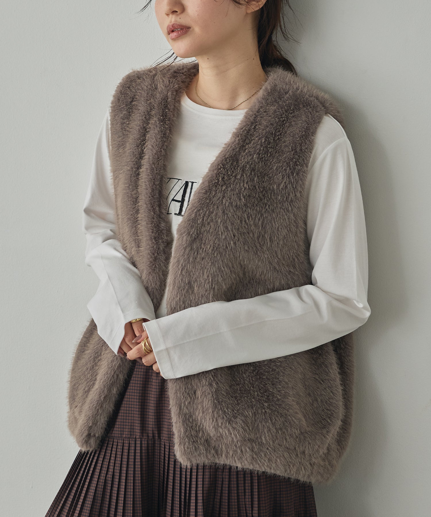 MIDI-LENGTH V-NECK FAUX FUR VEST