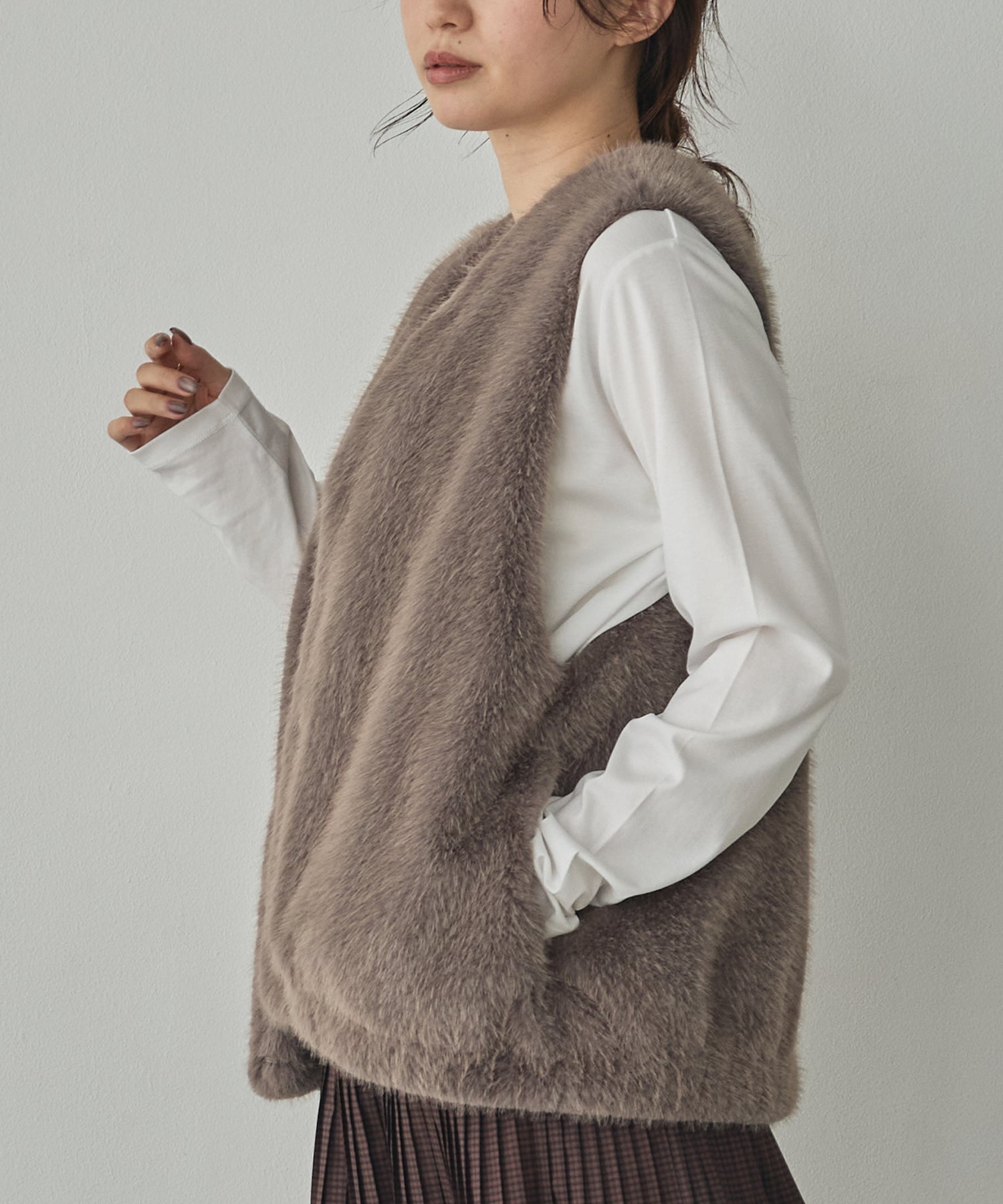 MIDI-LENGTH V-NECK FAUX FUR VEST