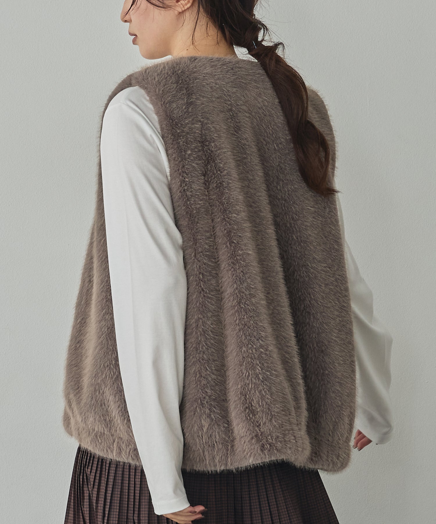 MIDI-LENGTH V-NECK FAUX FUR VEST