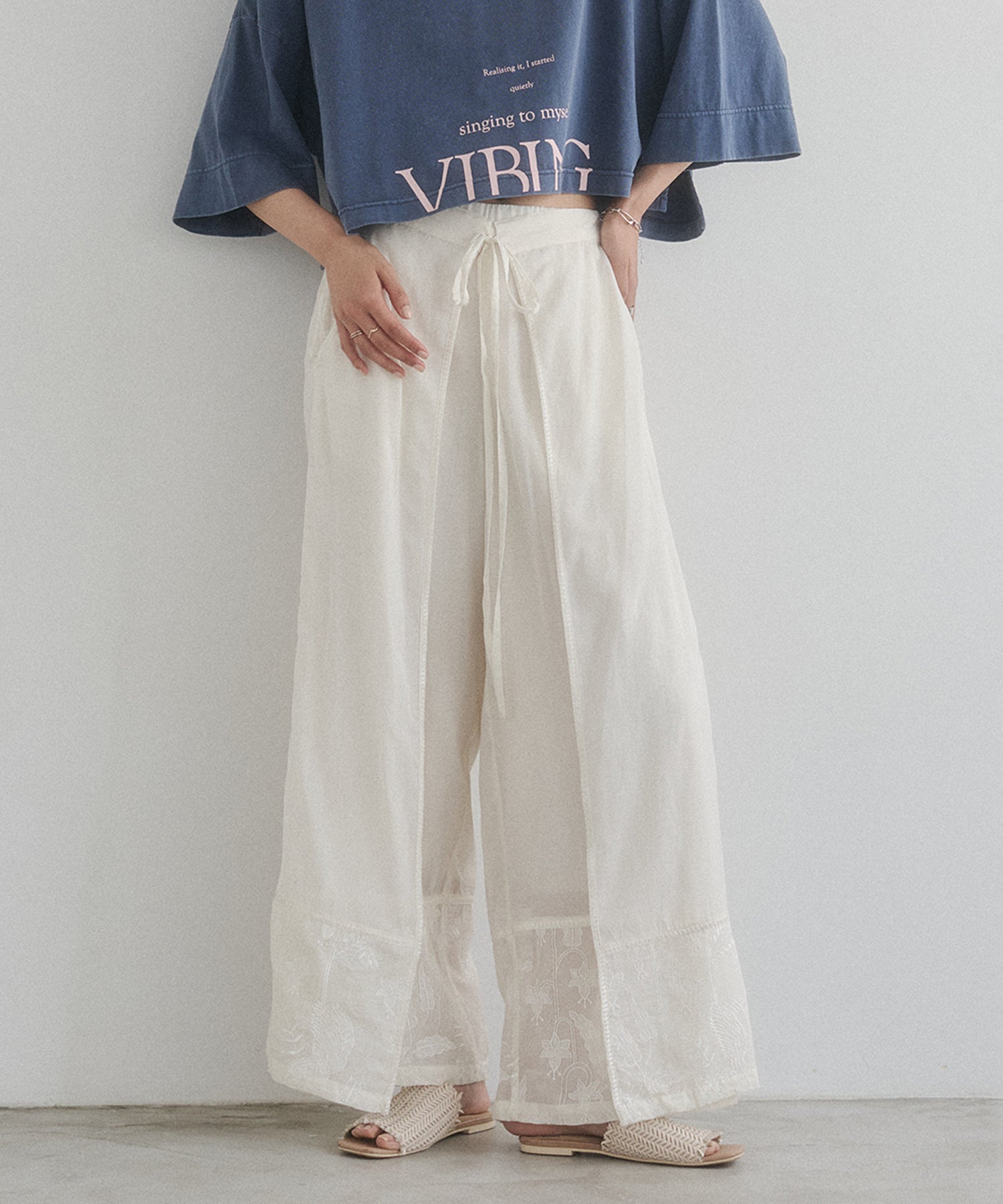 HEM-EMBROIDERED WRAP PANTS