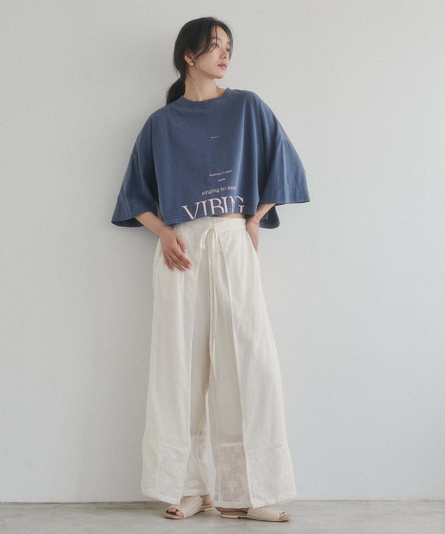 HEM-EMBROIDERED WRAP PANTS
