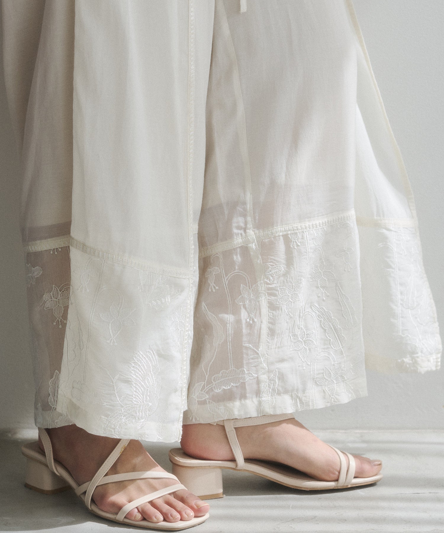 HEM-EMBROIDERED WRAP PANTS