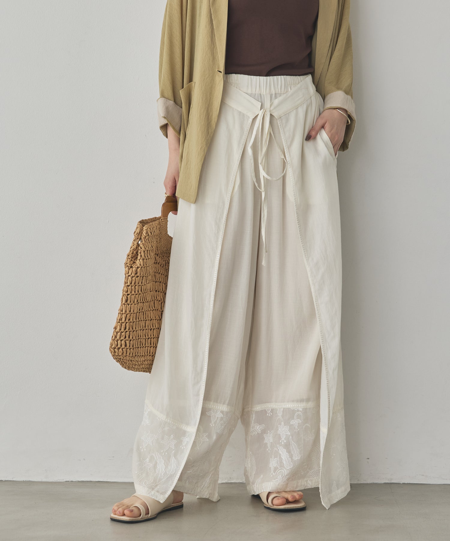 HEM-EMBROIDERED WRAP PANTS
