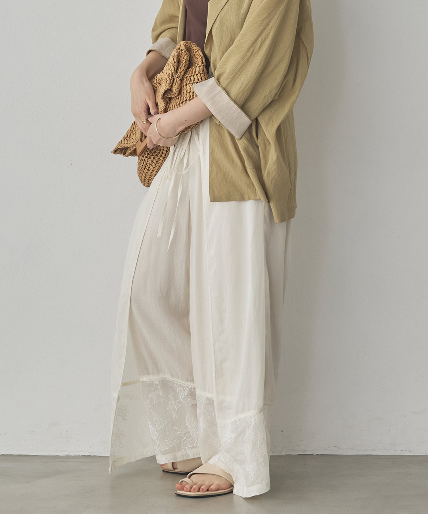 HEM-EMBROIDERED WRAP PANTS