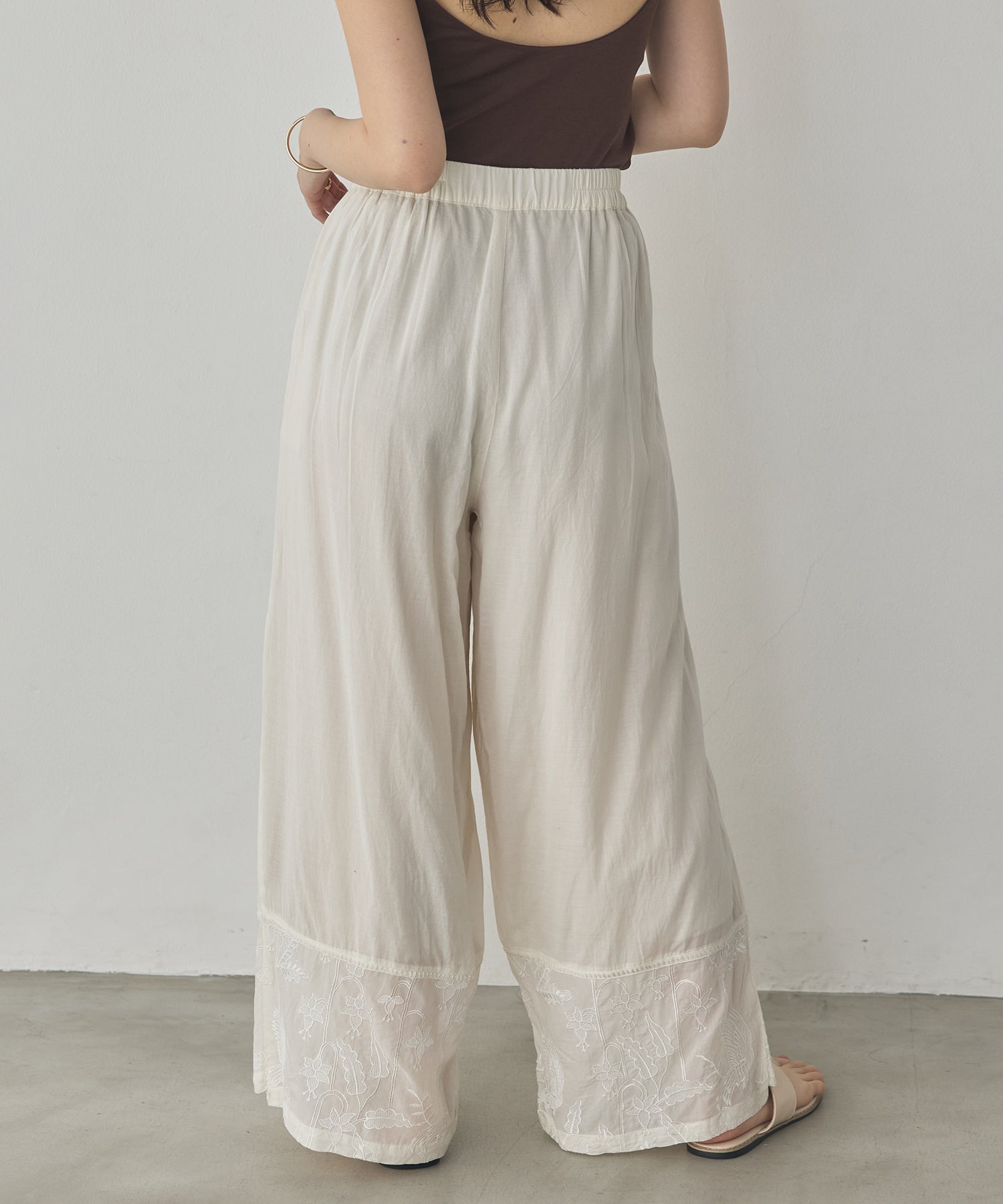 HEM-EMBROIDERED WRAP PANTS