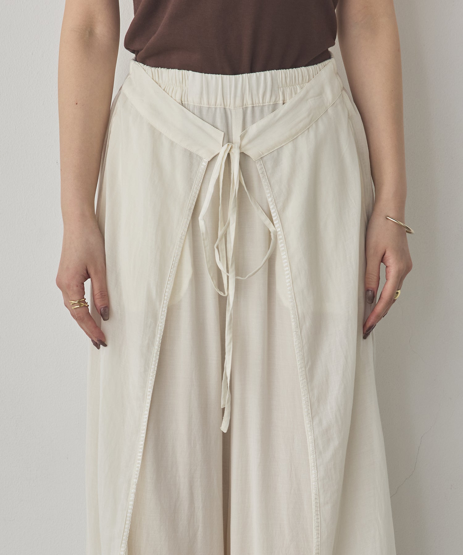 HEM-EMBROIDERED WRAP PANTS
