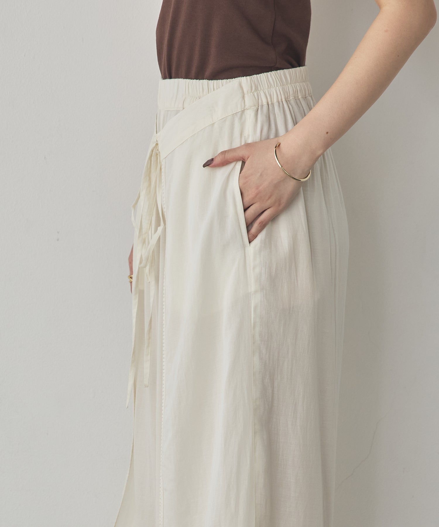 HEM-EMBROIDERED WRAP PANTS