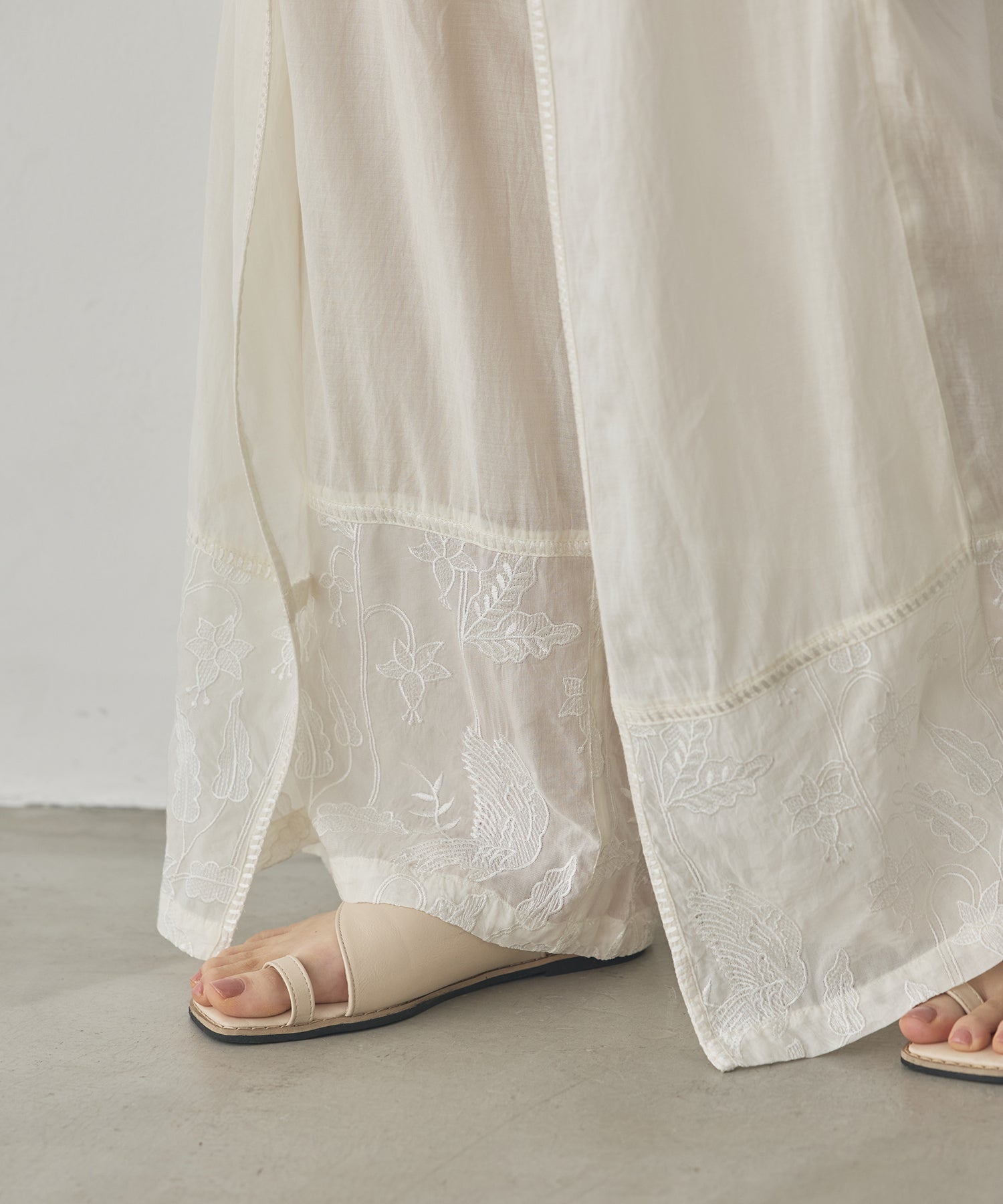 HEM-EMBROIDERED WRAP PANTS