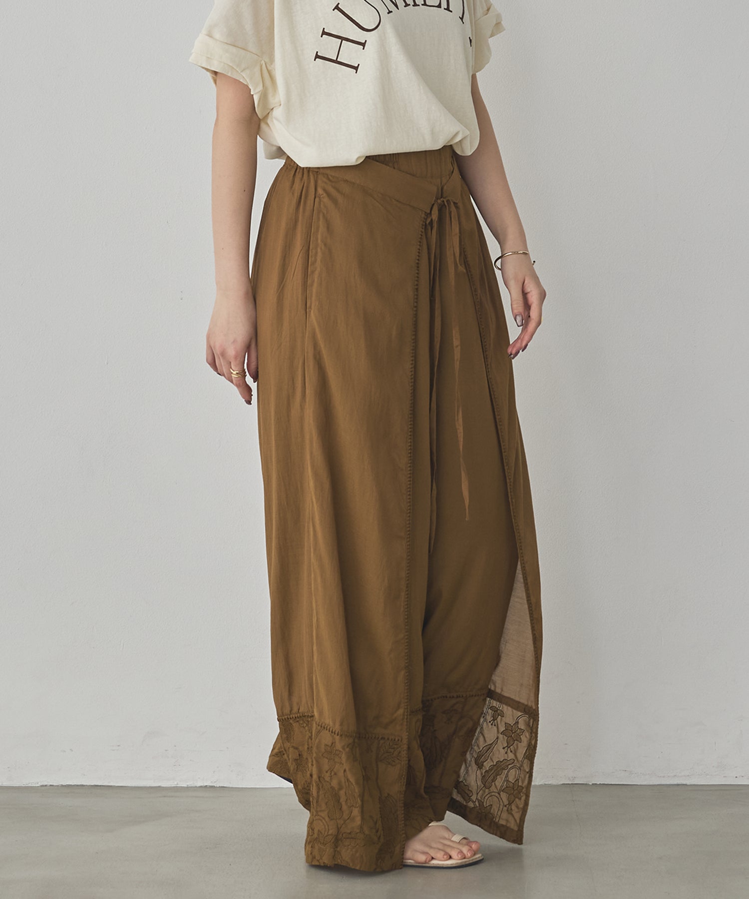 HEM-EMBROIDERED WRAP PANTS