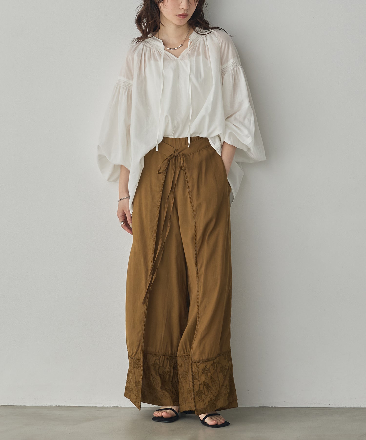 HEM-EMBROIDERED WRAP PANTS