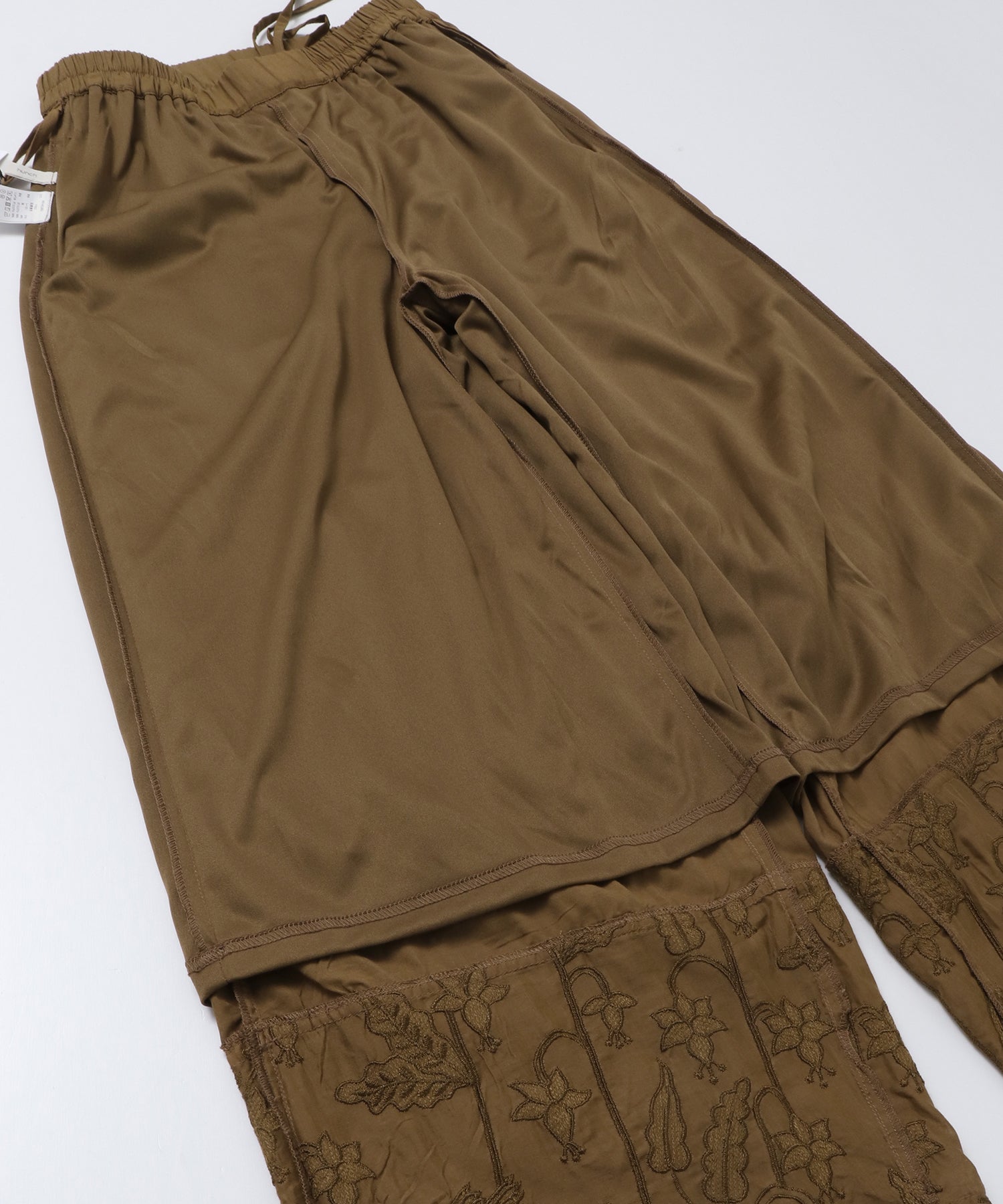 HEM-EMBROIDERED WRAP PANTS