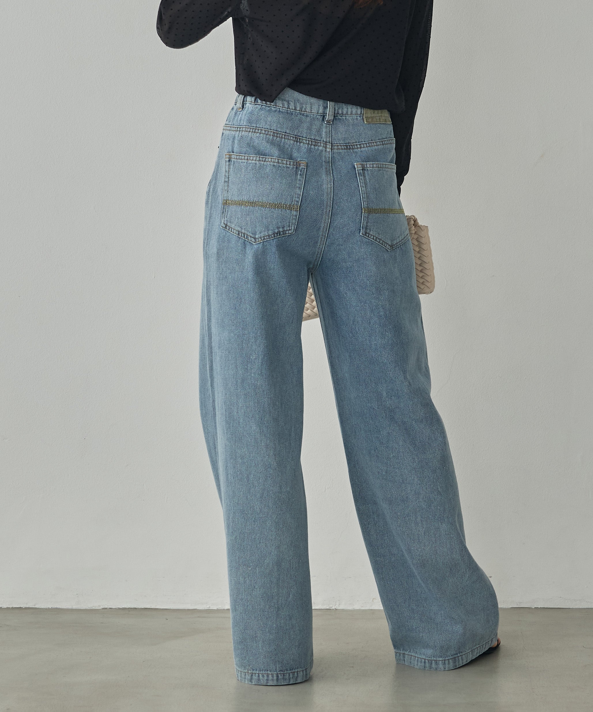CENTER-SEAM SEMI-FLARED DENIM PANTS