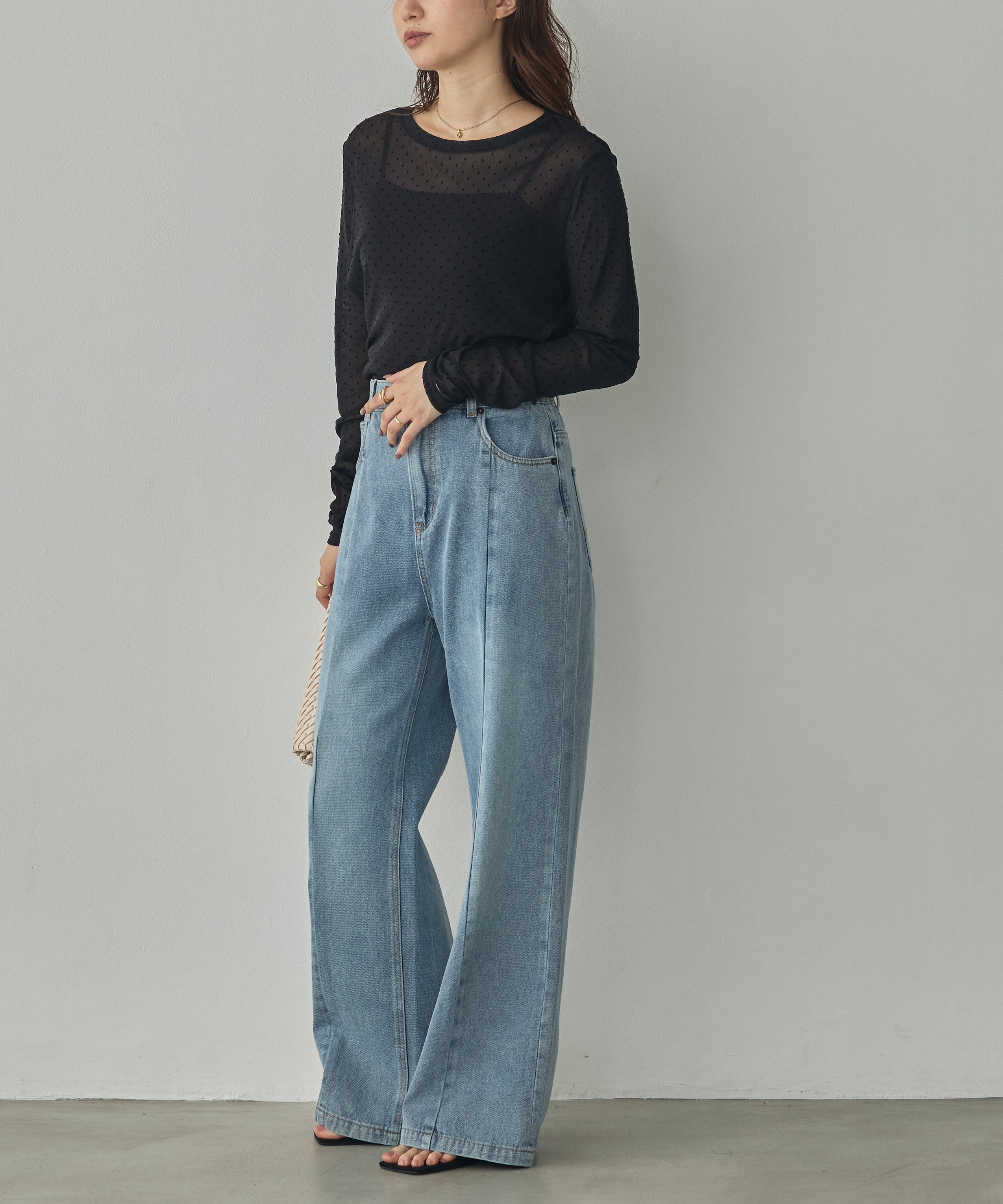 CENTER-SEAM SEMI-FLARED DENIM PANTS