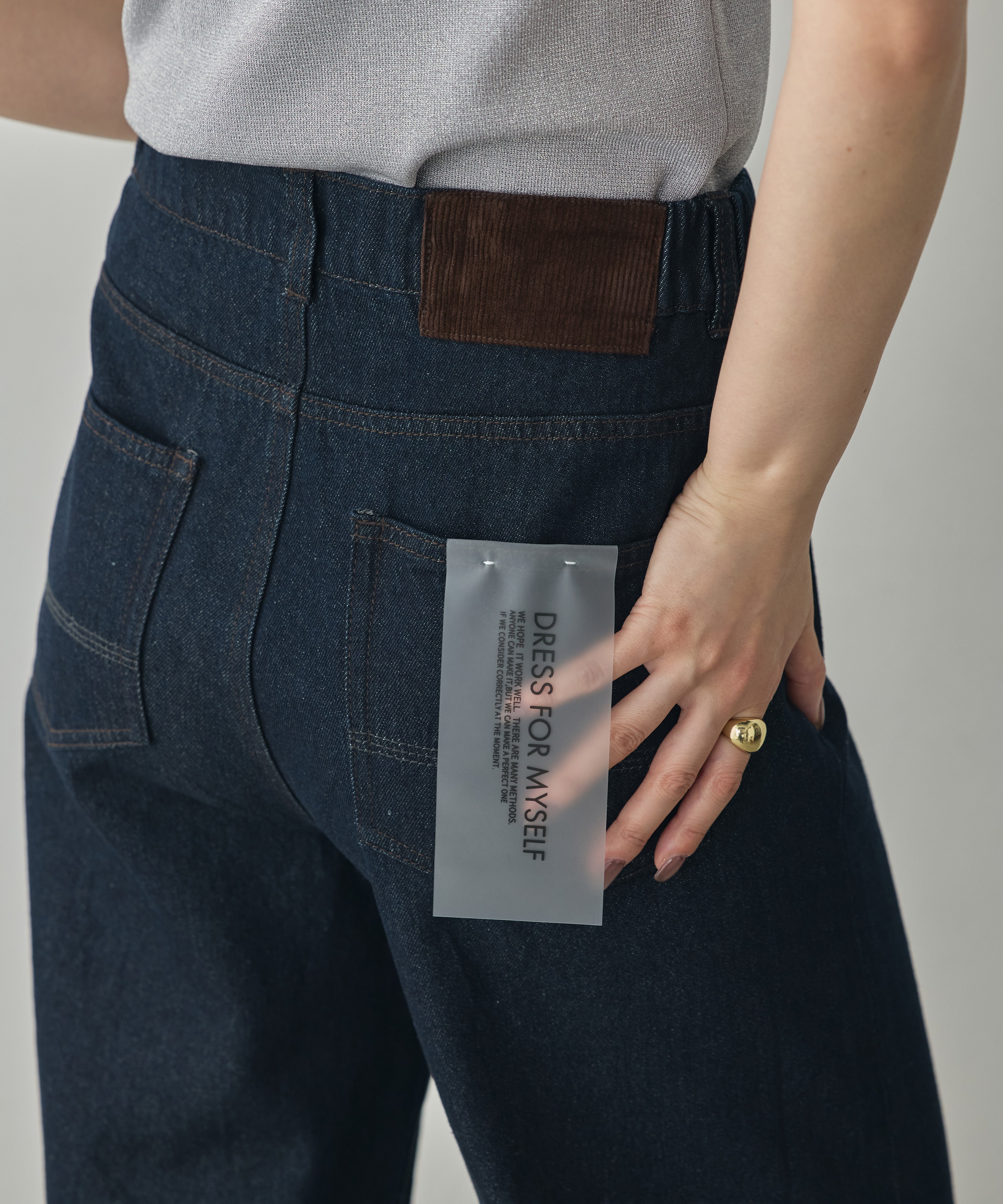 CENTER-SEAM SEMI-FLARED DENIM PANTS