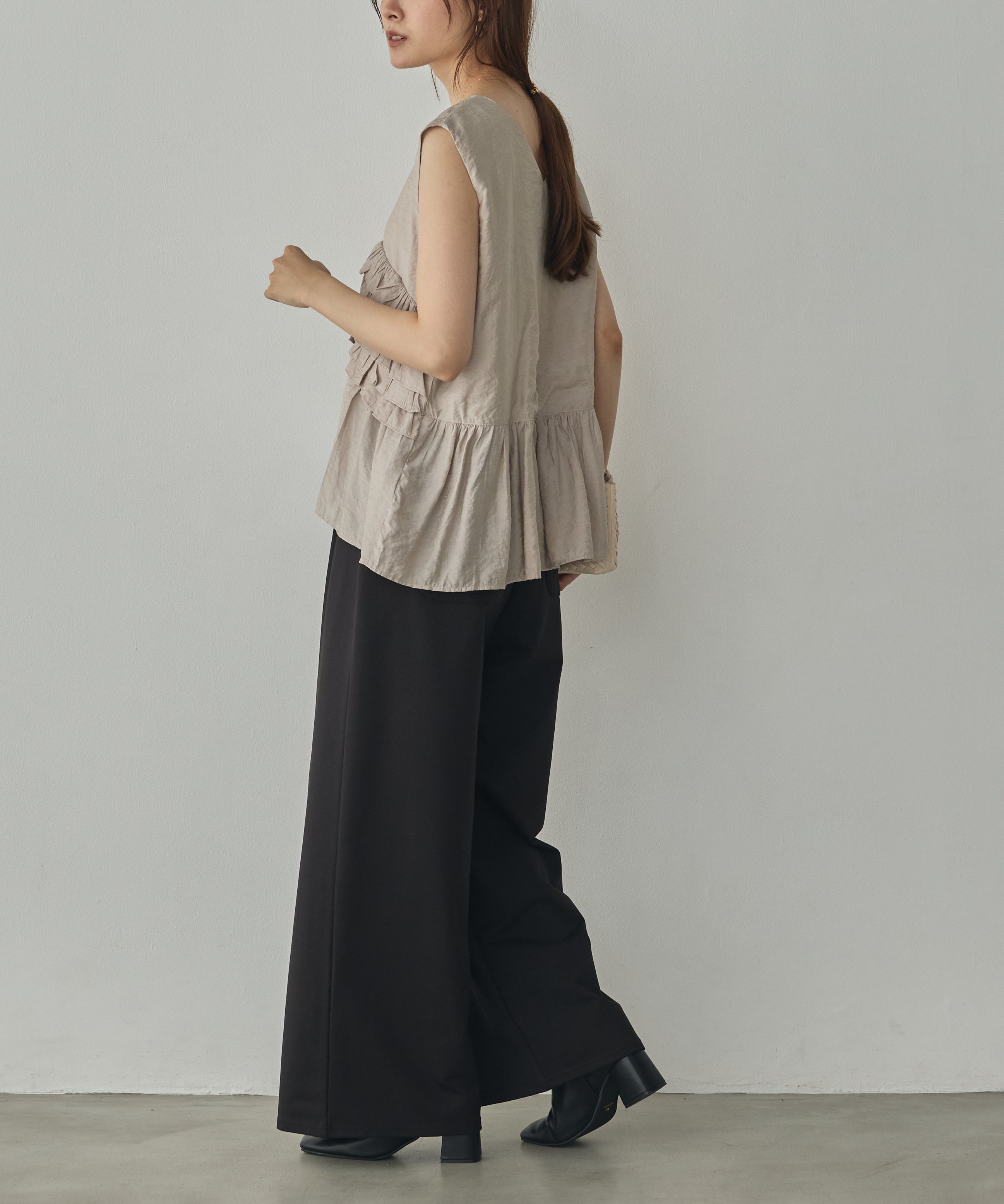 SLEEVELESS RUFFLED TOPS