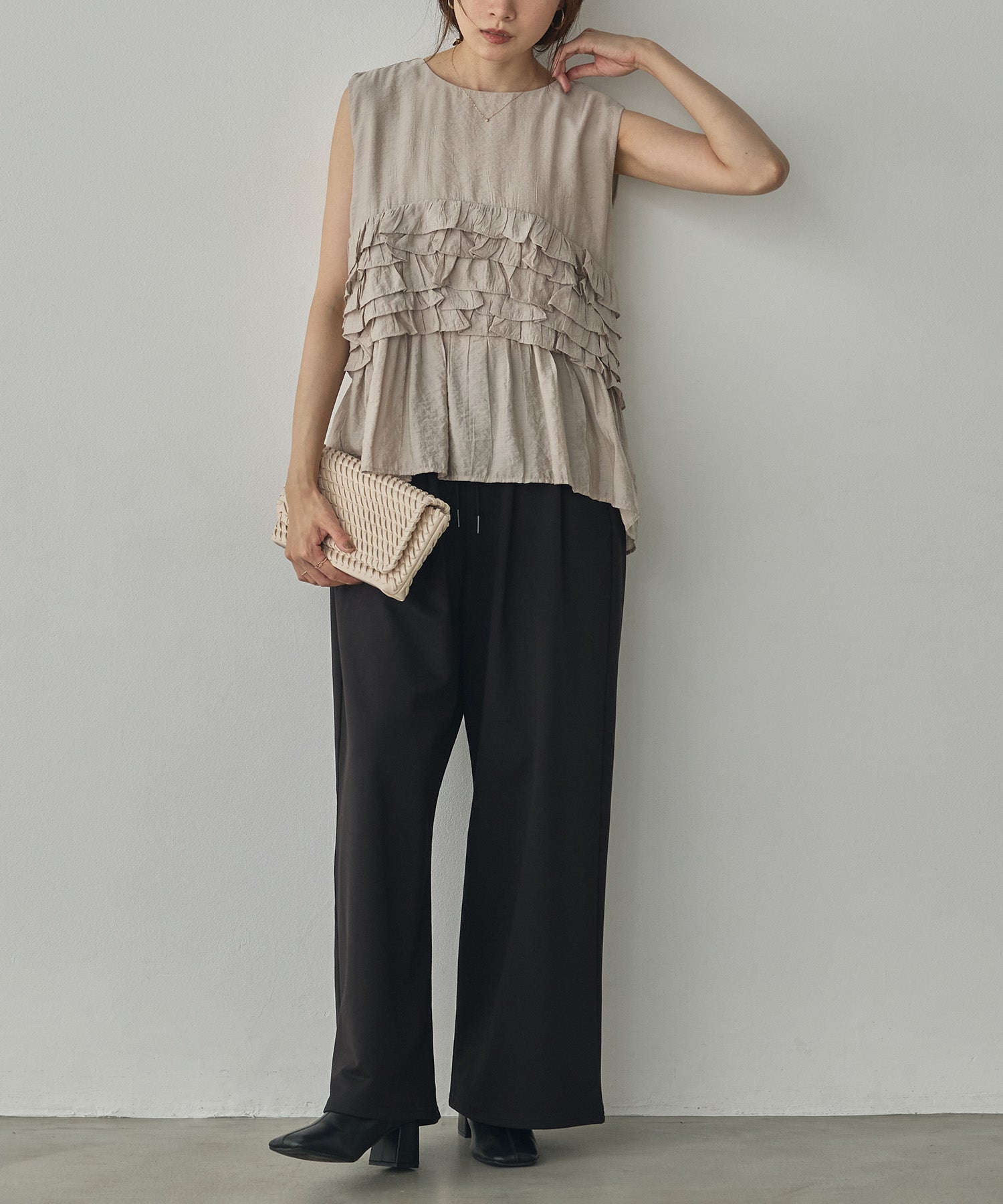 SLEEVELESS RUFFLED TOPS