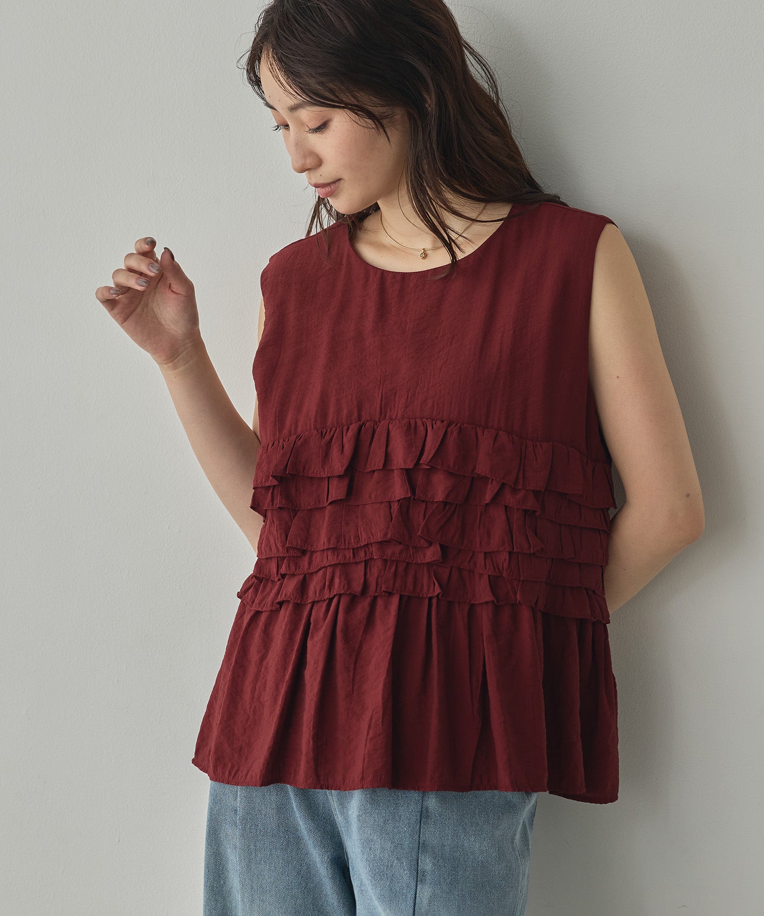 SLEEVELESS RUFFLED TOPS