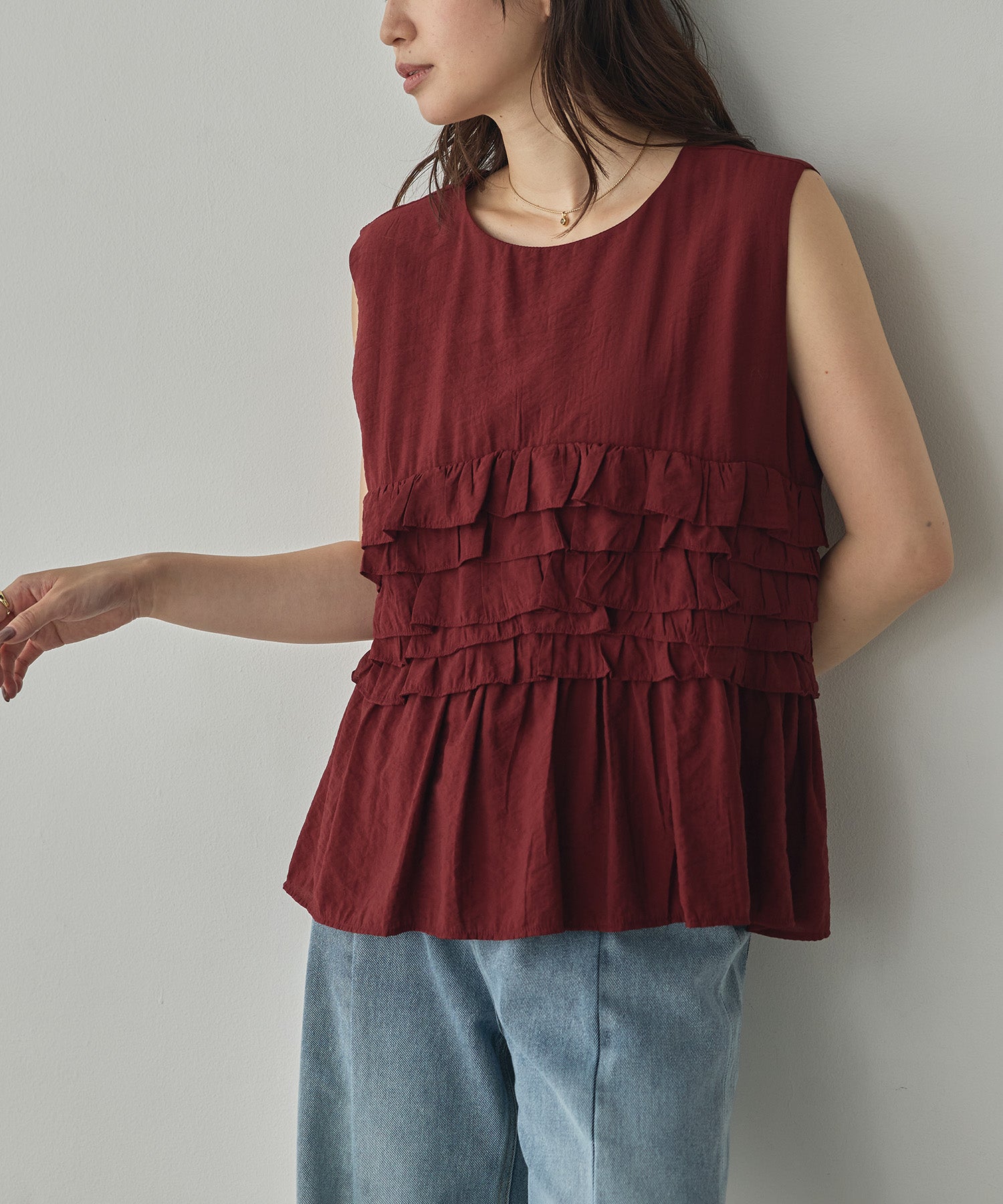 SLEEVELESS RUFFLED TOPS
