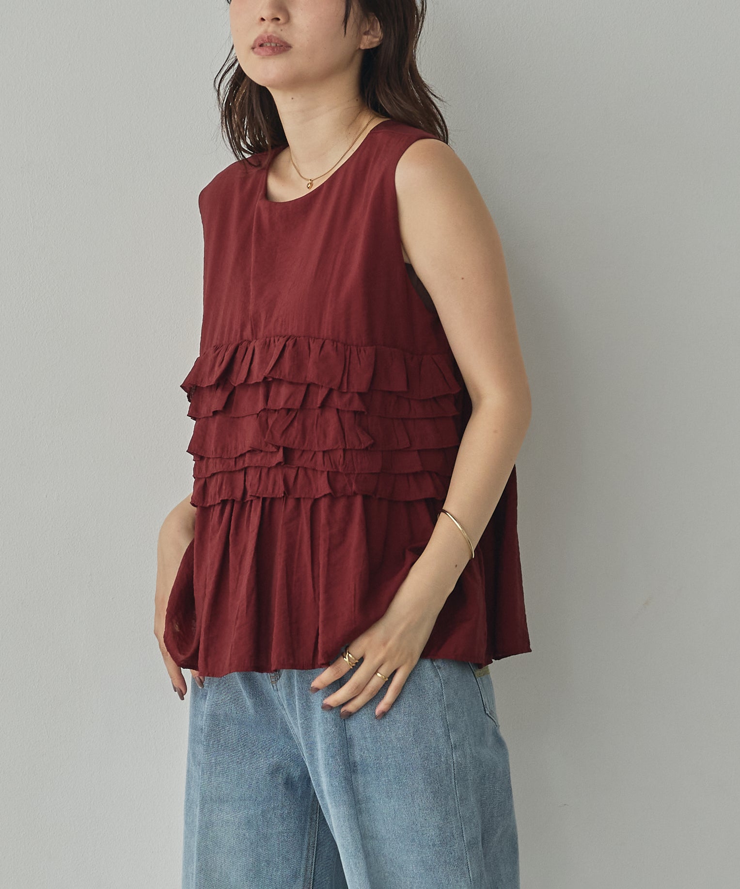 SLEEVELESS RUFFLED TOPS