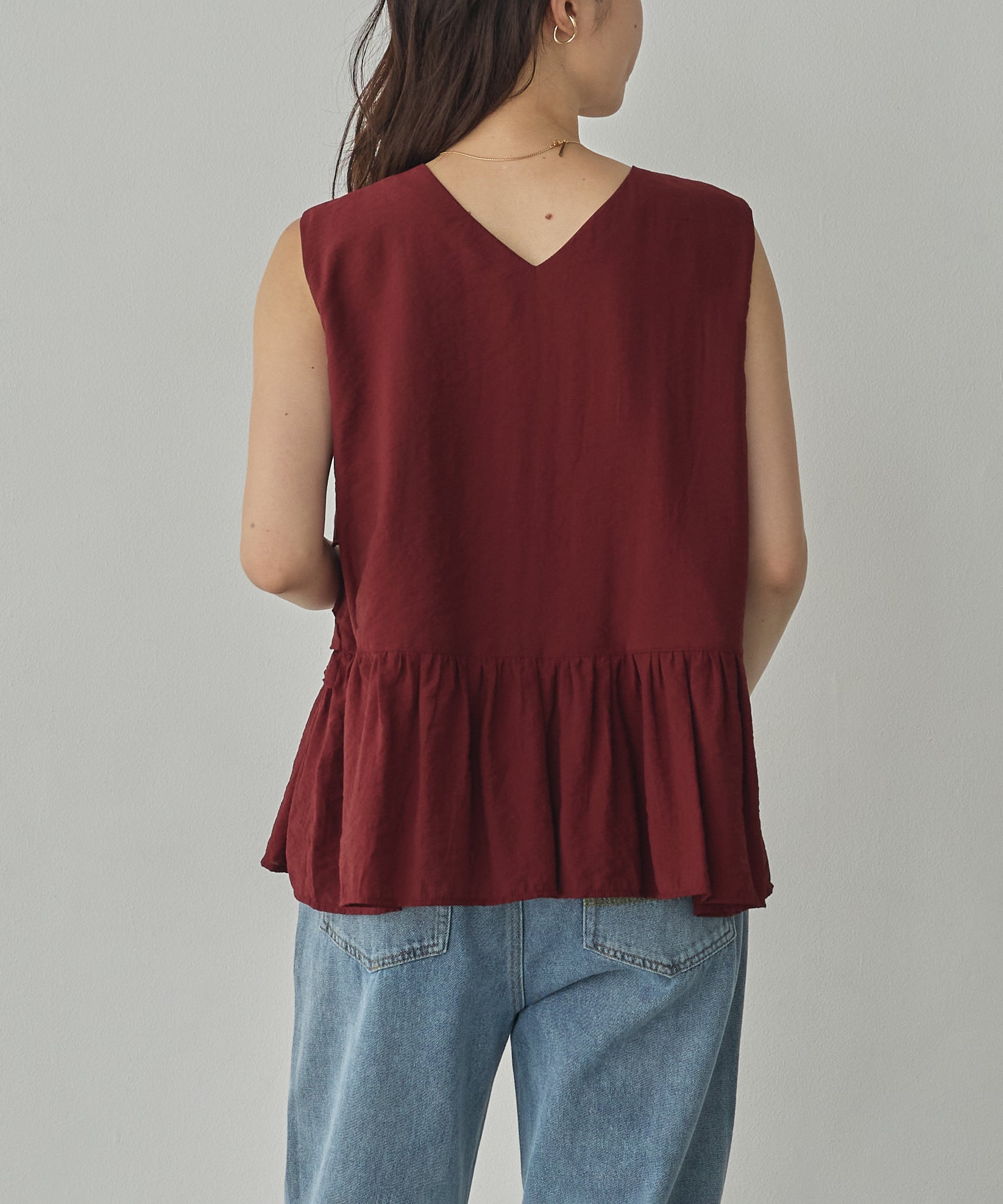 SLEEVELESS RUFFLED TOPS