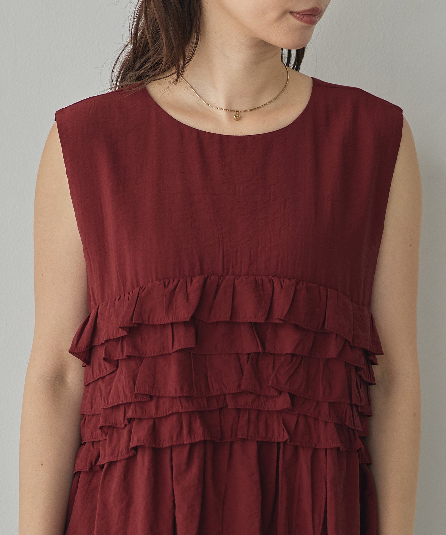 SLEEVELESS RUFFLED TOPS