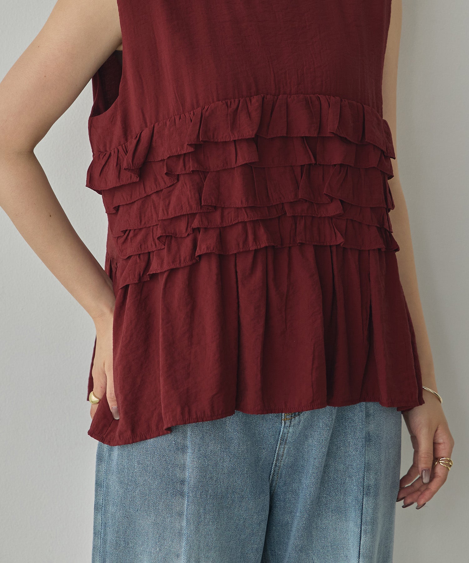 SLEEVELESS RUFFLED TOPS