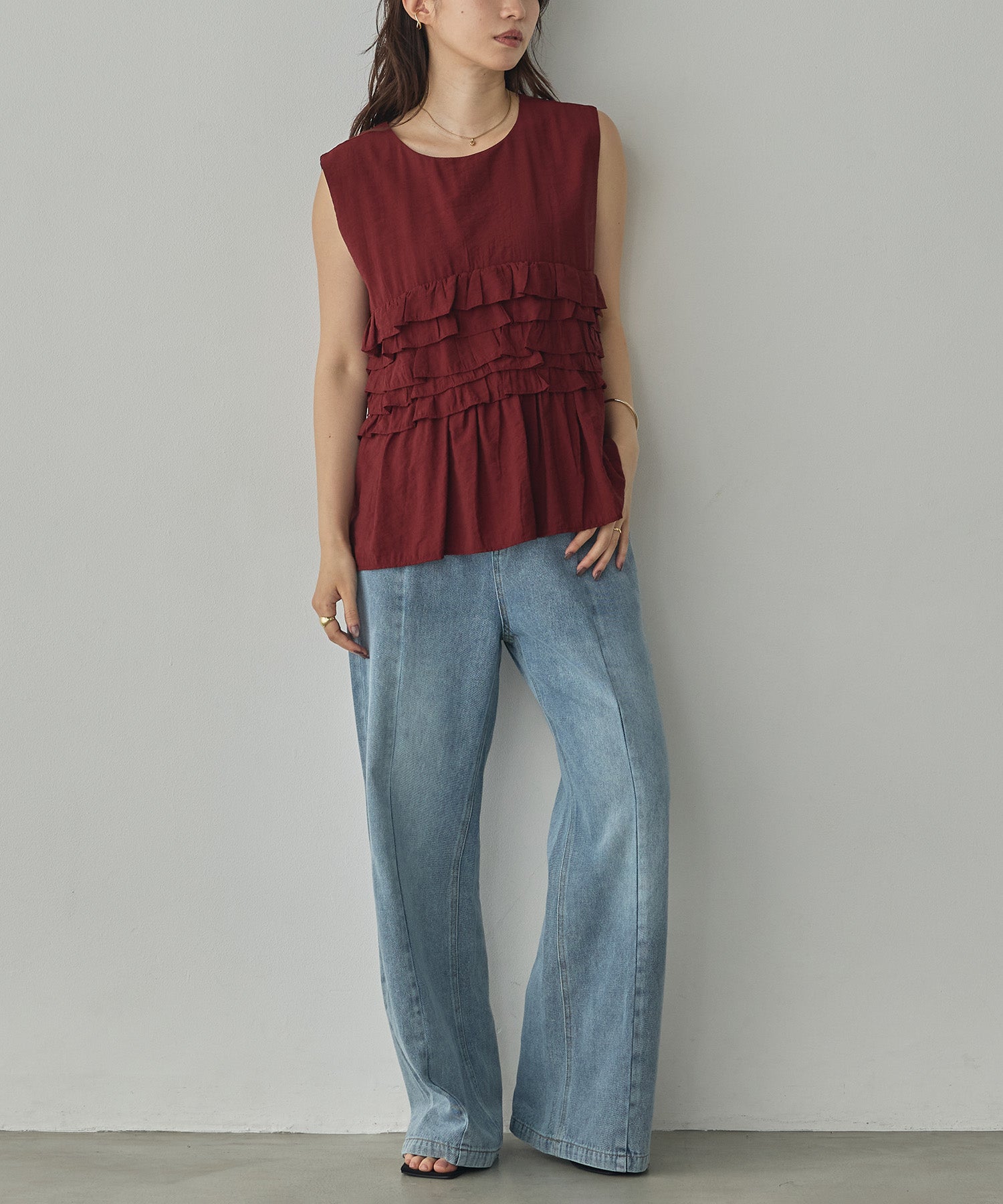 SLEEVELESS RUFFLED TOPS