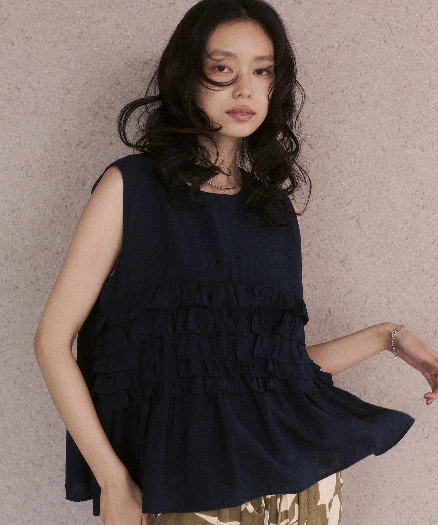 SLEEVELESS RUFFLED TOPS