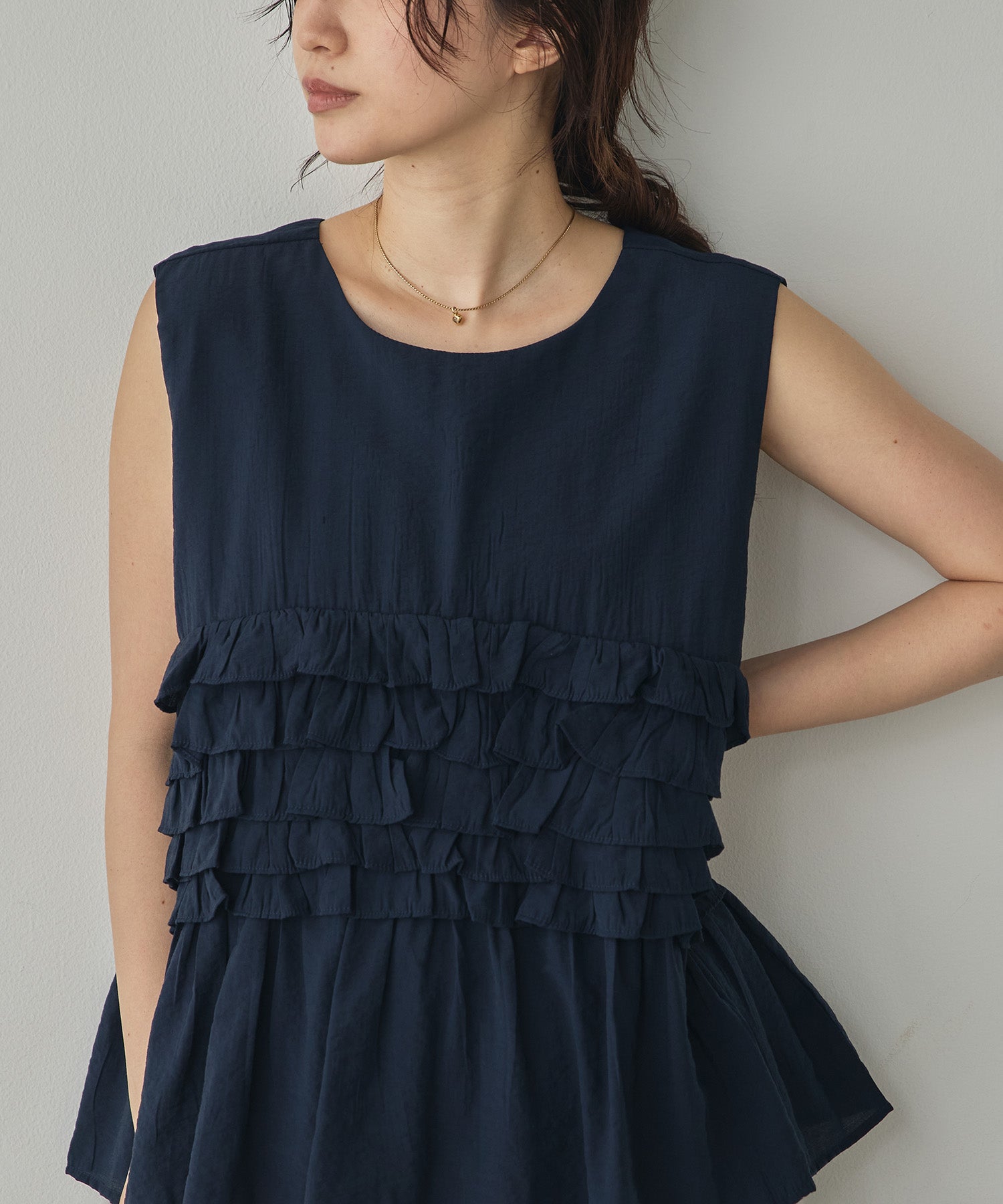SLEEVELESS RUFFLED TOPS